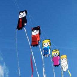 five one off design doll kites in train